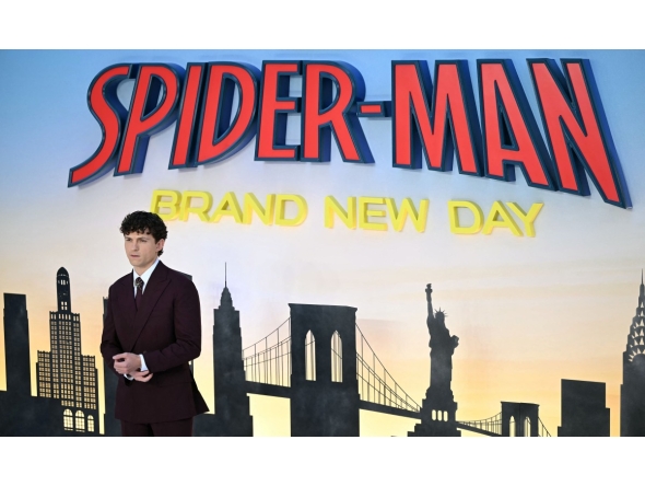 British actor Tom Holland poses on the red carpet upon arrival to attend the UK premiere for 'Spider-Man: Brand New Day UK' at the Odeon Luxe Leicester Square in central London on July 29, 2026. (Photo by JUSTIN TALLIS / AFP)