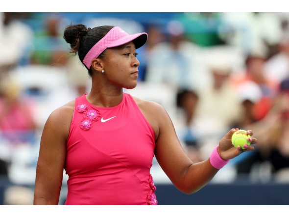 Naomi Osaka of Japan serves during a women's singles match against Alexandra Eala of the Philippines on day six of the Mubadala DC Open 2026 at William H.G. FitzGerald Tennis Center on August 01, 2026 in Washington, DC. Emilee Chinn/Getty Images/AFP 