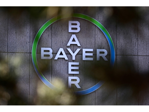 The company logo of German chemical giant Bayer is pictured at the company's site in Berlin on March 4, 2026. Photo by Tobias SCHWARZ / AFP