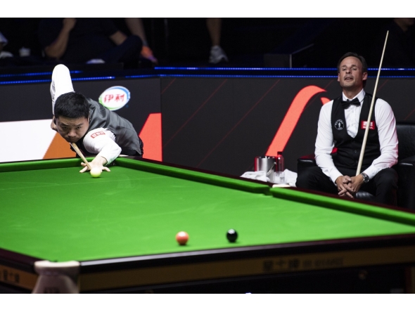 Ding Junhui (L) of China competes during the round 1 match between Ding Junhui of China and David Gilbert of England at China Open 2026 snooker tournament in Taiyuan, north China's Shanxi Province, Aug. 8, 2026. (Xinhua/Cao Yang)