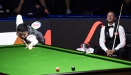 Ding Junhui (L) of China competes during the round 1 match between Ding Junhui of China and David Gilbert of England at China Open 2026 snooker tournament in Taiyuan, north China's Shanxi Province, Aug. 8, 2026. (Xinhua/Cao Yang)