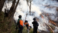 FILE PHOTO: Joint forces battle a fire at Bromo Tengger Semeru National Park, Probolinggo Regency, East Java, Indonesia. (Photo by Bayu Novanta/Xinhua)