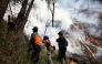 FILE PHOTO: Joint forces battle a fire at Bromo Tengger Semeru National Park, Probolinggo Regency, East Java, Indonesia. (Photo by Bayu Novanta/Xinhua)