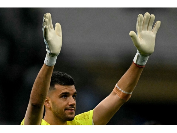 Marseille's Argentinian goalkeeper #01 Geronimo Rulli celebrates at the end of the French L1 football match between Olympique de Marseille (OM) and Stade Rennais FC at the Stade Velodrome in Marseille, southern France, on May 17, 2026. Photo by Gabriel BOUYS / AFP