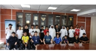 Officials with a group of students who participated in an awareness session.