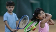 This photo taken on August 7, 2026, shows children taking part in a training session at Alabang Tennis Academy in Muntinlupa, Metro Manila. Photo by JAM STA ROSA / AFP