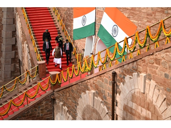 India's Prime Minister Narendra Modi (C, front) leaves after addressing the nation from the ramparts of the Red Fort during the celebrations to mark the country's Independence Day in New Delhi on August 15, 2026. (Photo by Sajjad HUSSAIN / AFP)