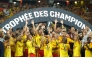 Lens' players celebrate with the championship trophy after winning the French Super Cup (Trophee des Champions) football match between RC Lens and Paris Saint-Germain (PSG) at the Stade Bollaert-Delelis in Lens, northern France on August 16, 2026. (Photo by GEOFFROY VAN DER HASSELT / AFP)