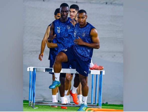 Al Duhail players attend a training session.