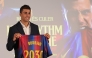 Spanish international footballer Rodri poses with a jersey bearing his name during his official presentation as FC Barcelona's new player on August 18, 2026 in Barcelona. (Photo by Lluis GENE / AFP)