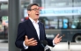 Britain's Prime Minister Andy Burnham speaks to the media, during his visit to Wolverhampton Bus Station, in Wolverhampton, central England on August 18, 2026. (Photo by Hannah McKay / AFP)