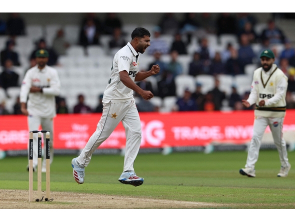 Pakistan's Khurram Shahzad celebrates taking the wicket England's Joe Root on day two of the first Test match between England and Pakistan at Headingley cricket ground in Leeds, northern England on August 20, 2026. (Photo by Darren Staples / AFP)