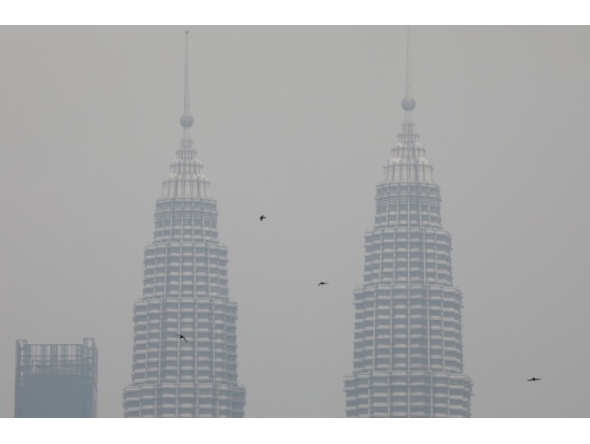 Petronas twin towers shrouded by haze in Kuala Lumpur. Reuters file photo.