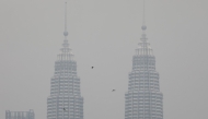 Petronas twin towers shrouded by haze in Kuala Lumpur. Reuters file photo.