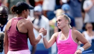Madison Keys of the United States is congratulated by Sara Bejlek of Czechia after their match during the quarterfinals on day eleven of the Cincinnati Open at the Lindner Family Tennis Center on August 21, 2026 in Mason, Ohio.  (Photo by MATTHEW STOCKMAN /AFP)