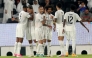 Al Sadd players celebrate during their match against Al Ahli.