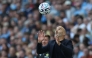 Manchester City's Italian manager Enzo Maresca catches the ball during the English Premier League football match between Manchester City and AFC Bournemouth at the Etihad Stadium in Manchester, north west England, on August 23, 2026. (Photo by Darren Staples / AFP) 