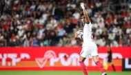 PSG's Spanish forward #09 Ferran Torres celebrates after scoring his team first goal during the French L1 football match between Stade Rennais FC and Paris Saint-Germain (PSG) at the Roazhon Park stadium in Rennes, western France on August 23, 2026. (Photo by ALAIN JOCARD / AFP)