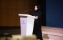 Director of the Scholarships Department Noura Mohammed Al Ansari speaking at the event.