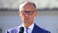 German Chancellor Friedrich Merz gives a statement prior to the start of a retreat meeting of the German cabinet on August 25, 2026 in Neuhardenberg, northeastern Germany. (Photo by John MACDOUGALL / AFP)