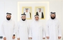 Minister of Awqaf and Islamic Affairs H E Ghanem bin Shaheen bin Ghanem Al Ghanim with other officials and Qatari contestant Yusuf Ahmed Yusuf Hassan Asheer.