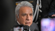 (FILES) Ecuador's former president (2017–2021) Lenin Moreno speaks with the media as he leaves the National Court of Justice over a corruption case in Quito, on May 11, 2026.  (Photo by Rodrigo BUENDIA / AFP)