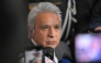 (FILES) Ecuador's former president (2017–2021) Lenin Moreno speaks with the media as he leaves the National Court of Justice over a corruption case in Quito, on May 11, 2026.  (Photo by Rodrigo BUENDIA / AFP)