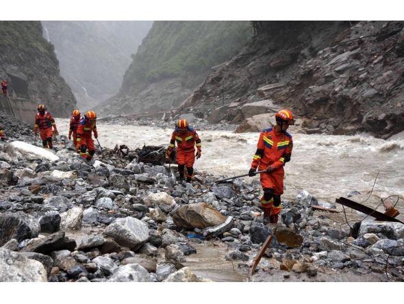 Fire and rescue personnel conduct search and rescue operations 2 kilometers from Gyirong Port days after the August 26 mudslide which destroyed the port, in Gyirong County, in China western Tibet region on August 29, 2026. (Photo by CNS / AFP) 