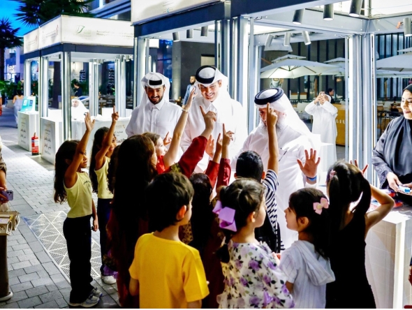 Officials and children during one of the activities