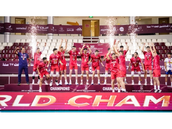 Iran players celebrate with the trophy after beating France in the final.