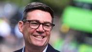 Britain's Prime Minister Andy Burnham smiles during a visit to Bath, western England, on July 22, 2026. Photo by Toby Melville / POOL / AFP
