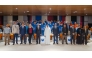 UDST President Dr. Salem Al-Naemi with officials, professors and young professionals from Uzbekistan during the completion of a 10-month vocational training programme.