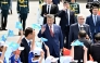 Chinese President Xi Jinping greets the welcoming crowd in Astana, Kazakhstan, June 16, 2025. (Xinhua/Yin Bogu)