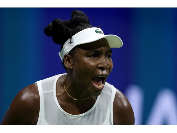 Venus Williams of the United States reacts against Sofia Kenin of the United States during her Women's Singles First Round match on Day One of the 2026 US Open at USTA Billie Jean King National Tennis Center on August 30, 2026 in the Flushing neighborhood of the Queens borough of New York City. (Mike Stobe/Getty Images/AFP)