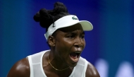Venus Williams of the United States reacts against Sofia Kenin of the United States during her Women's Singles First Round match on Day One of the 2026 US Open at USTA Billie Jean King National Tennis Center on August 30, 2026 in the Flushing neighborhood of the Queens borough of New York City. (Mike Stobe/Getty Images/AFP)