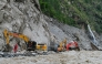 Workers use excavators to clear debris and rebuild the mudslide-damaged road which leads to Gyirong Port in Gyirong County, in China's western Tibet region on August 30, 2026. Photo by CNS / AFP
