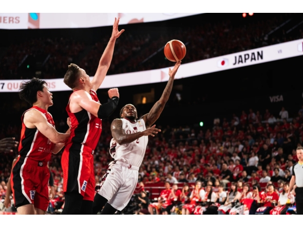 Action during the match between Qatar and Japan.