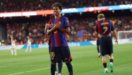 Barcelona's Spanish forward #10 Lamine Yamal celebrates scoring his team's fifth goal during the Spanish league football match between FC Barcelona and Rayo Vallecano de Madrid at Camp Nou Stadium in Barcelona on August 31, 2026. (Photo by Lluis GENE / AFP)