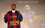 Brazilian forward Gabriel Jesus poses with his jersey during his official presentation as FC Barcelona's new football player on September 1, 2026 in Barcelona. (Photo by Lluis GENE / AFP)