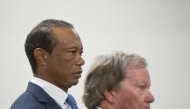 US golfer Tiger Woods (L) appears in County Judge Darren Steele's courtroom for a plea hearing from an arrest in March at the Martin County Courthouse in Stuart, Florida in September 2, 2026. Photo by Crystal Vander Weit / POOL / AFP