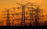 This picture taken on November 12, 2025 shows power poles near the lignite-fired power station operated by German energy giant RWE near Niederaussem, part of Bergheim, western Germany. Photo by Ina FASSBENDER / AFP