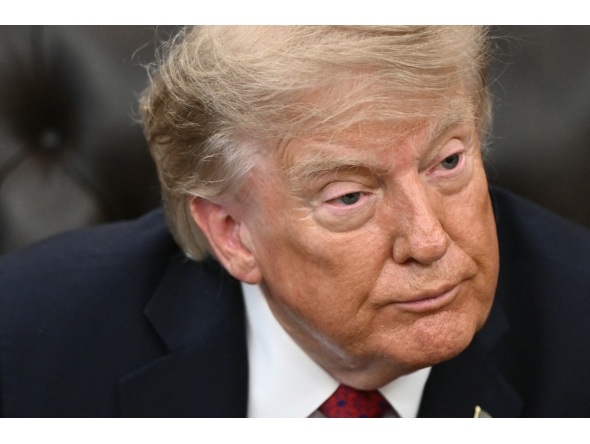 US President Donald Trump looks on during an announcement on Healthcare Affordability in the Oval Office of the White House in Washington, DC, on August 31, 2026. (Photo by Brendan SMIALOWSKI / AFP)