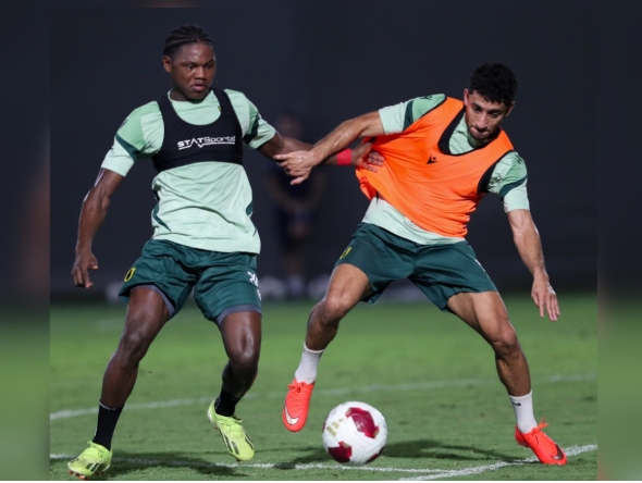 Qatar SC players in action during a training session. 