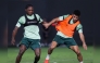 Qatar SC players in action during a training session. 