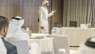 An MoJ official presents key data findings to attendees.