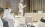 An MoJ official presents key data findings to attendees.