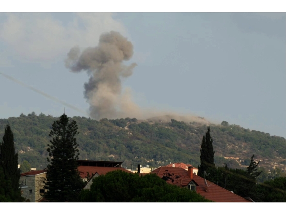 (FILES) A photograph taken from the southern Lebanese area of Nabatieh shows smoke as it rises from the site of Israeli strikes that targeted the hilltops of the mountainous area of the strategic Ali al-Taher Ridge on August 14, 2026. (Photo by AFP) /