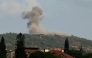 (FILES) A photograph taken from the southern Lebanese area of Nabatieh shows smoke as it rises from the site of Israeli strikes that targeted the hilltops of the mountainous area of the strategic Ali al-Taher Ridge on August 14, 2026. (Photo by AFP) /