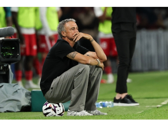 Paris Saint-Germain's Spanish head coach Luis Enrique watches from the touchline during the French L1 football match between Paris Saint-Germain (PSG) and AS Monaco at the Parc des Princes stadium in Paris on September 4, 2026. (Photo by Anne-Christine POUJOULAT / AFP)