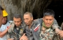 This handout photograph taken and released on September 5, 2026 via the Facebook page of Nepal Army shows security personnel carrying a Chinese national (2R) rescued from the Audit Tunnel 4 of the Upper Trishuli-1 Hydropower Project site in Nepal's Rasuwa district. (Photo by Handout / Nepal Army Facebook Page / AFP)